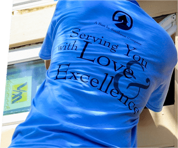 A blue t-shirt with the text "Serving You with Love & Excellence" is displayed.