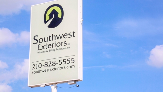 Here’s a close-up of a Southwest Exteriors sign.
