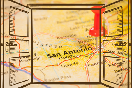 A map of San Antonio, Texas through an opened doorway