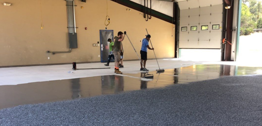 people cleaning the floor