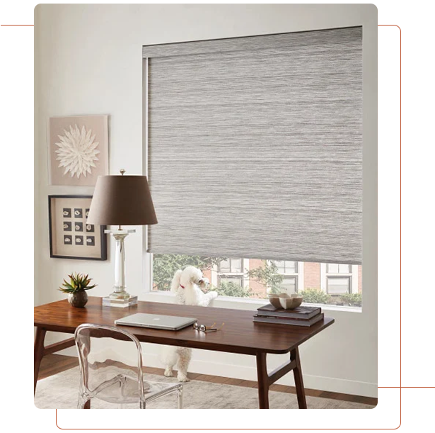 Hunter Douglas roller shades in a home office.
