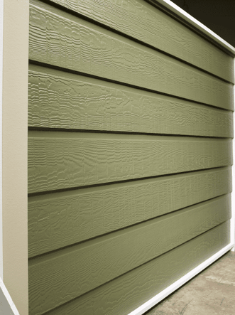 An olive color wall with dutch lap siding in a cedar finish.