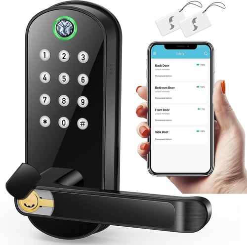 A black smart locking system with a finger print reader and a hand holding a smartphone next to it.