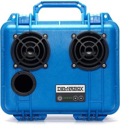 A large blue Bluetooth speaker with a handle on the top. 