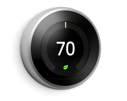 A Nest thermostat that reads 70 degrees on the monitor. 