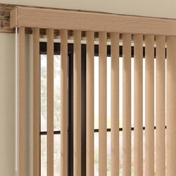 Faux wood vertical blinds on a sliding glass door. 