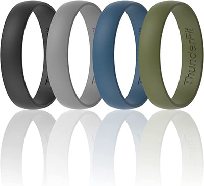A set of four silicon wedding bands in colors black, grey, blue, and army green.